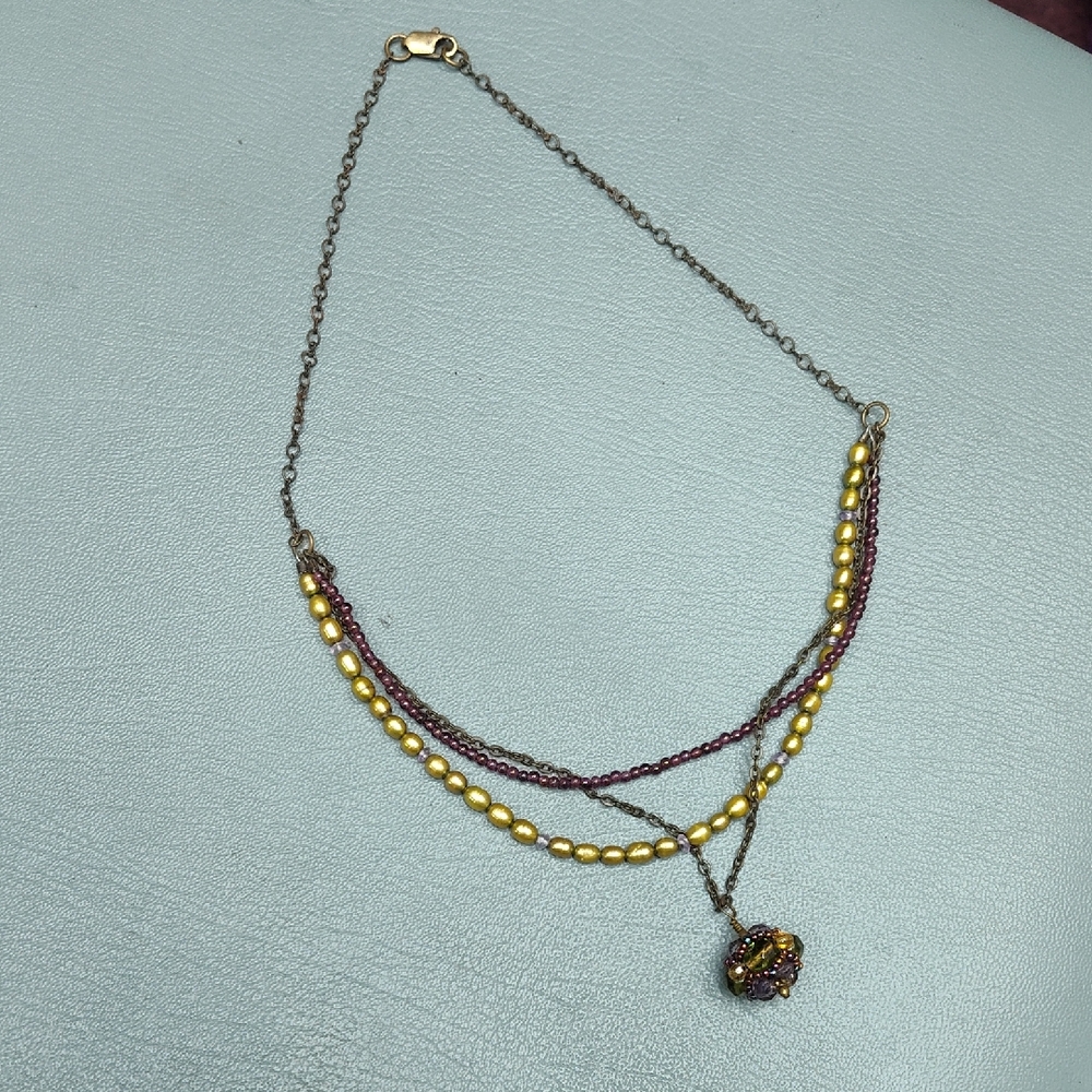 Elegant Gold and Purple Beaded Necklace